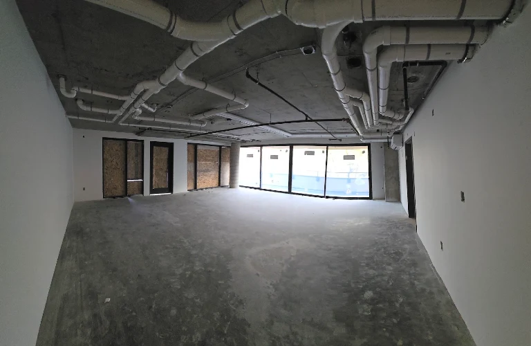 Commercial shell with overhead plumbing rough-in